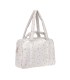 Bolso de maternidad Nalea de Lässig, rectangular en color blanco con dulce estampado y cómodas asas dobles.
