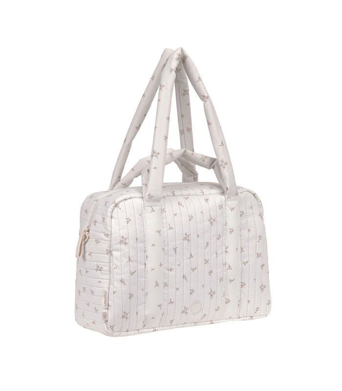 Bolso de maternidad Nalea de Lässig, rectangular en color gris claro con estampado de puntos y cómodas asas dobles.
