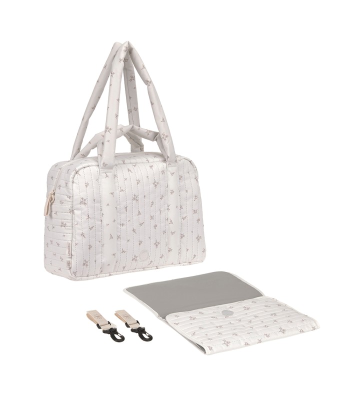 Bolso de maternidad Nalea de Lässig blanco con estampado, incluye cambiador y ganchos para el carrito.