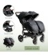 Silla gemelar VentTwin + Niu negra con asientos paralelos, capotas extensibles, cestilla inferior y cubrepiés acolchados.