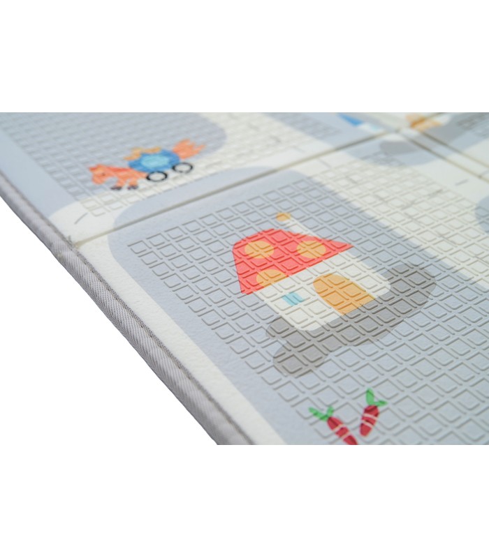 Reversible soft play mat