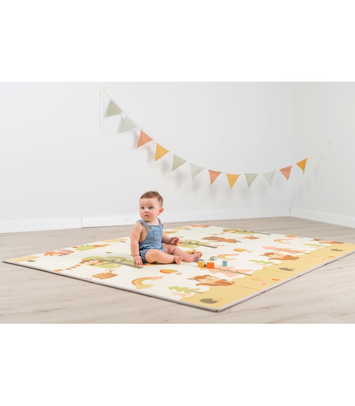 Reversible soft play mat